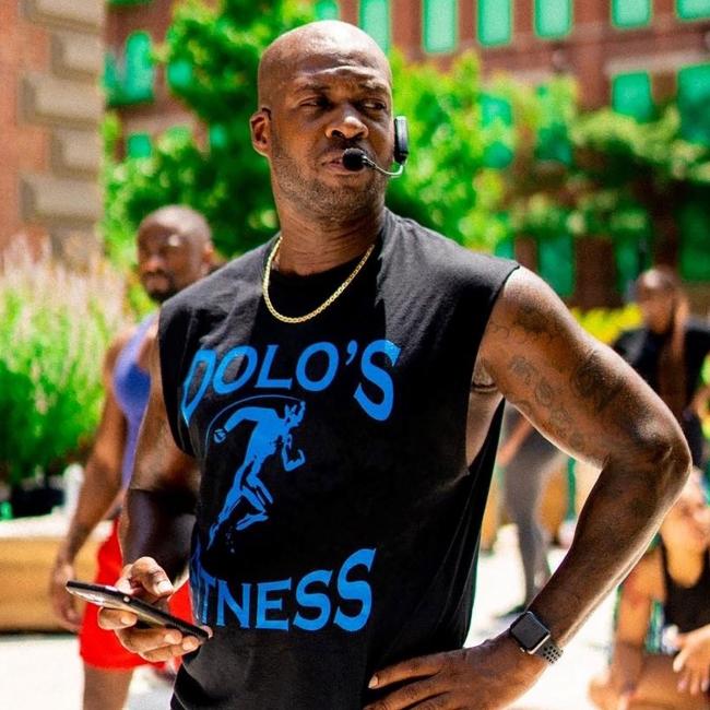 Doyen "Dolo" Grant leads a workout outside of his gym.