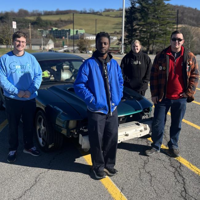 Alex and students with the Mustang Cobra