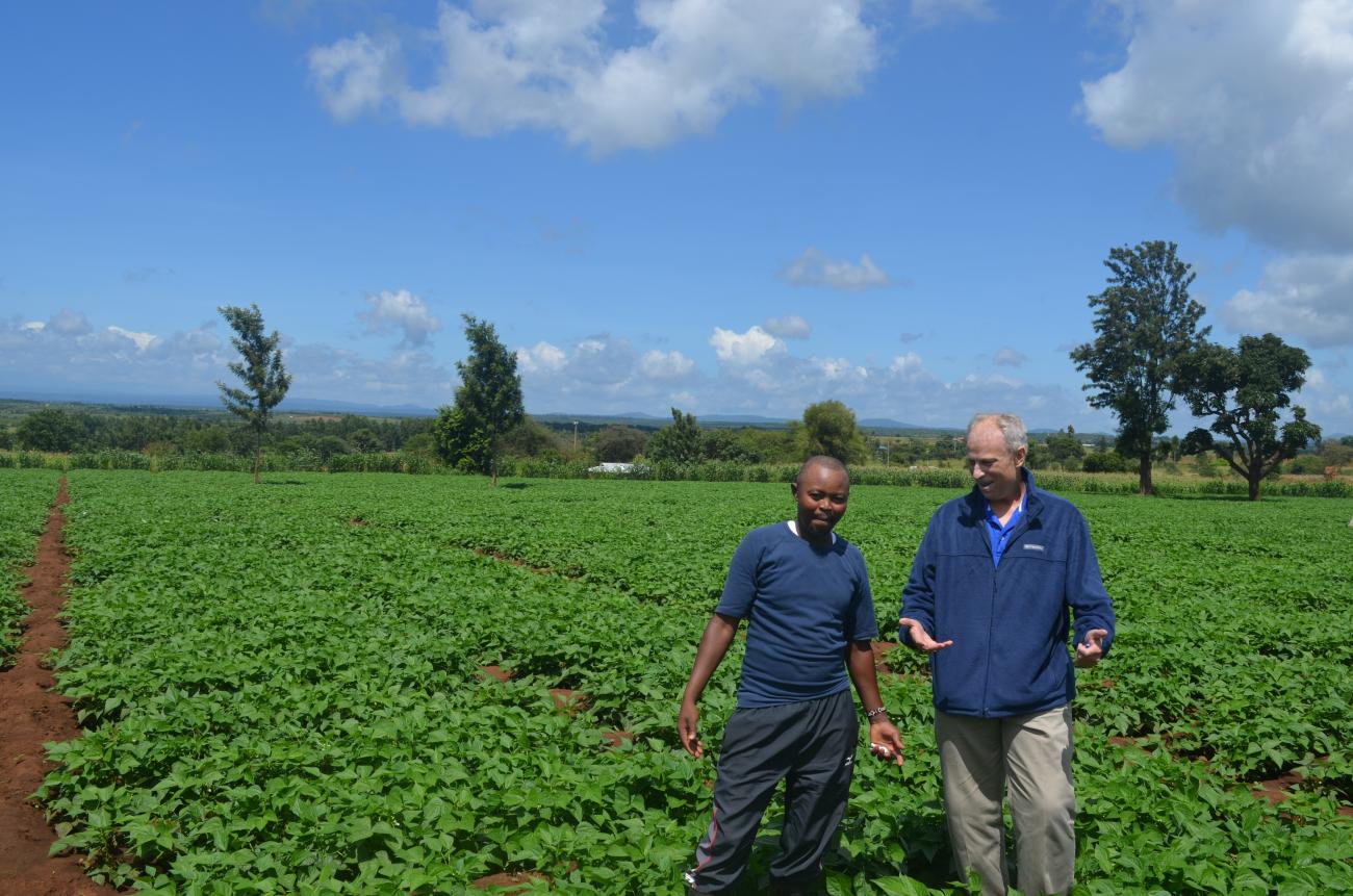 Christopher Scalzo, associate professor of business and entrepreneurship at SUNY Morrisville, gathers information from a farmer during his trip to Kenya, East Africa.  