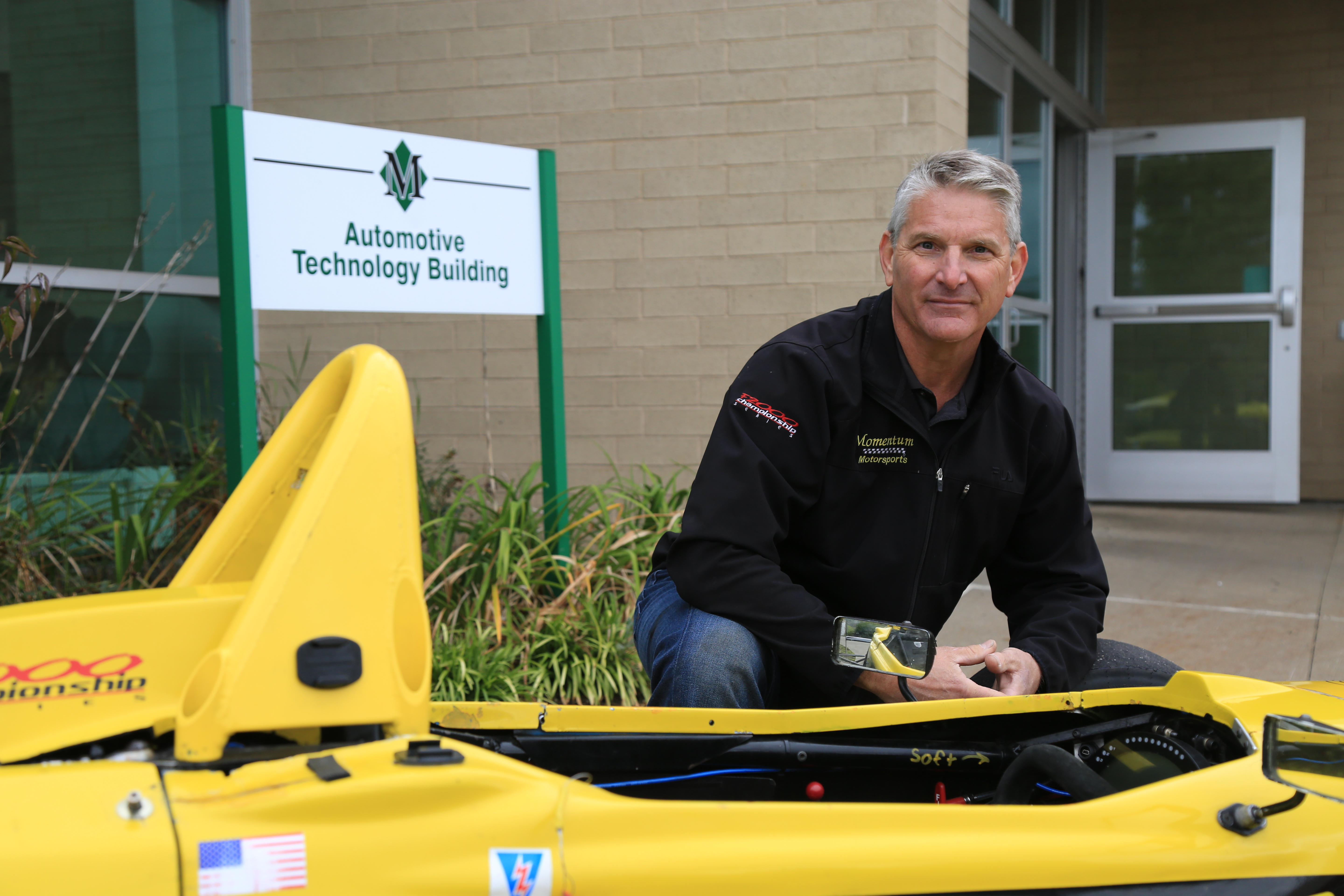 Phil Picard poses with his vehicle