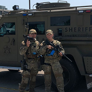 Justanna Bohling poses during a SWAT school final scenario with Ike Bobseine, now a fellow member of the Special Operations Group.