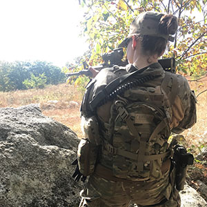 Justanna Bohling practices with an AR-15 (semiautomatic rifle).