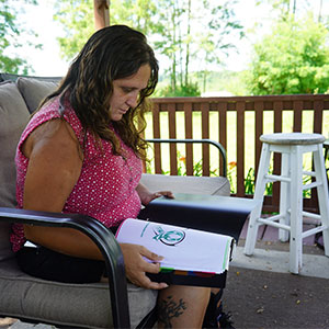 Megan Viera reads a project she wrote for class.