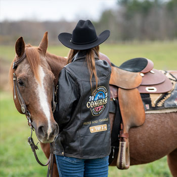 Maggie Herbert is pictured with Kicks and Giggles in the jacket she was awarded competing in the All American Quarter Horse Congress