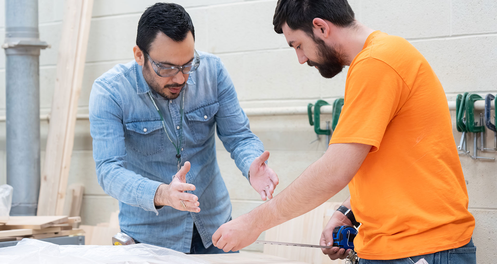 Professor Mohammadali Azadfar works with Gabriel Teeter, a student and teaching assistant.