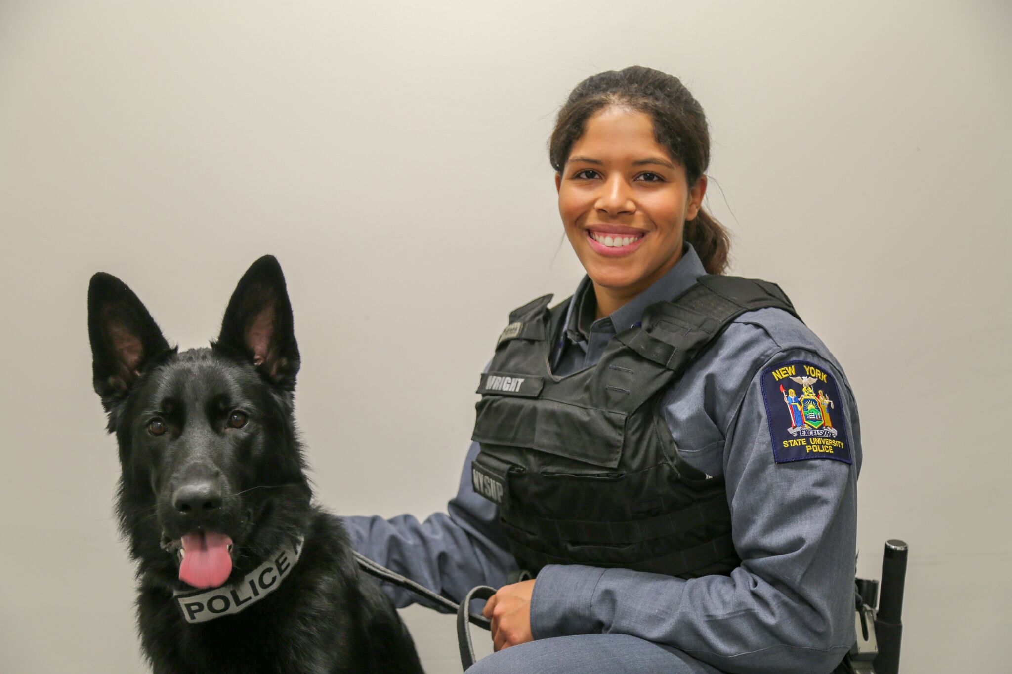 University police officer Nicole Wright with canine officer Bruin