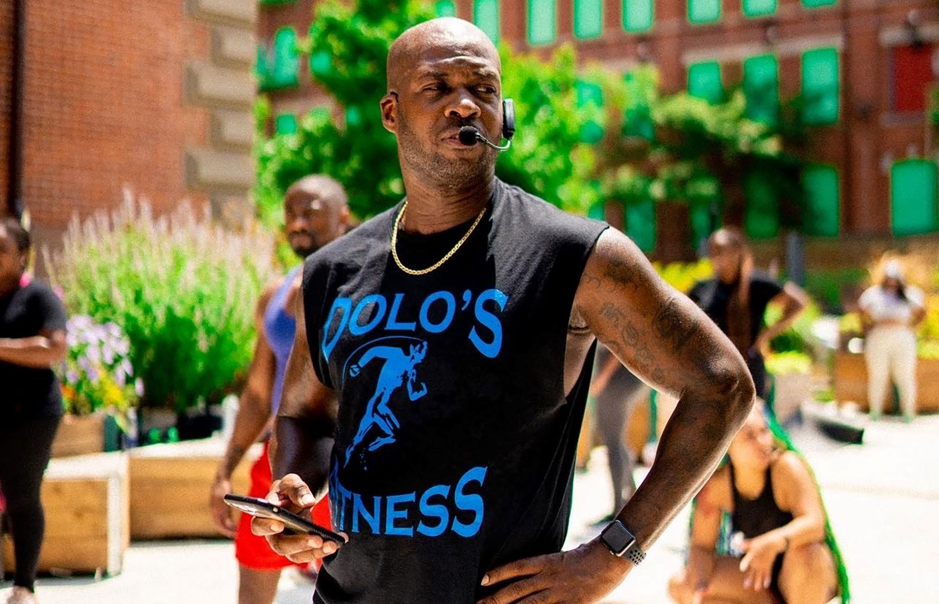 Doyen "Dolo" Grant leads a workout outside of his gym.