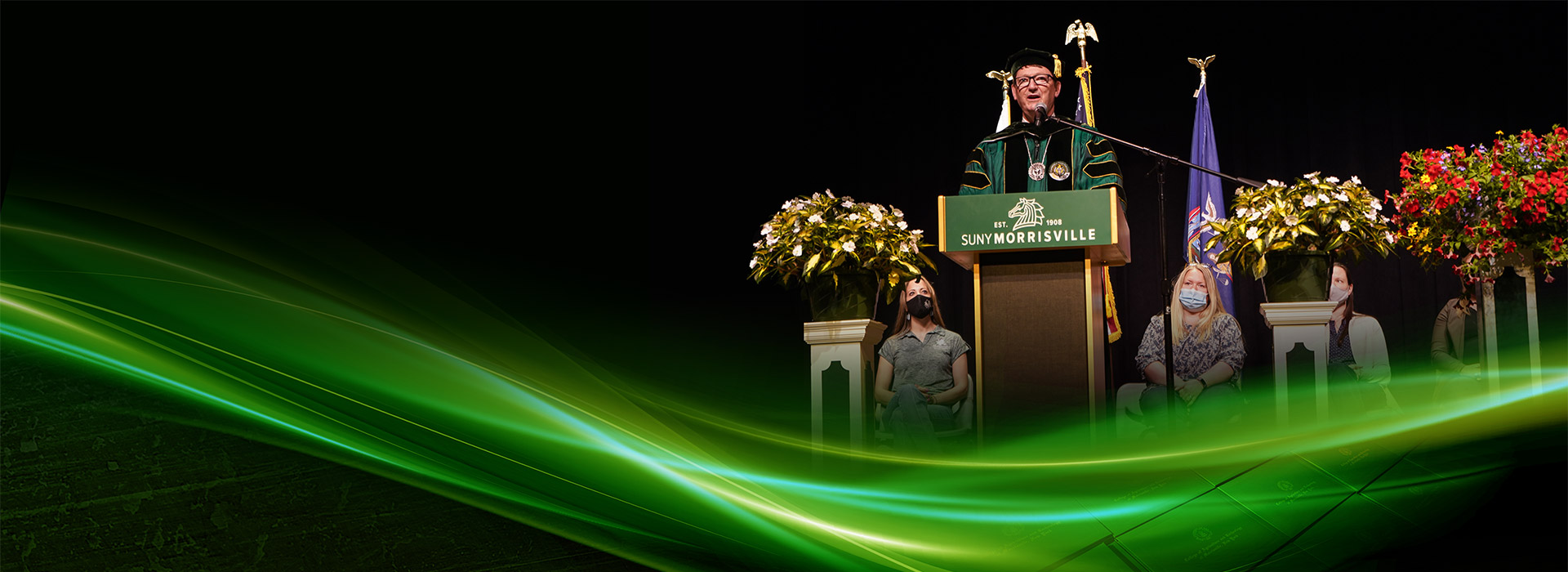 President David E. ROgers presides over a 2021 academic celebration ceremony