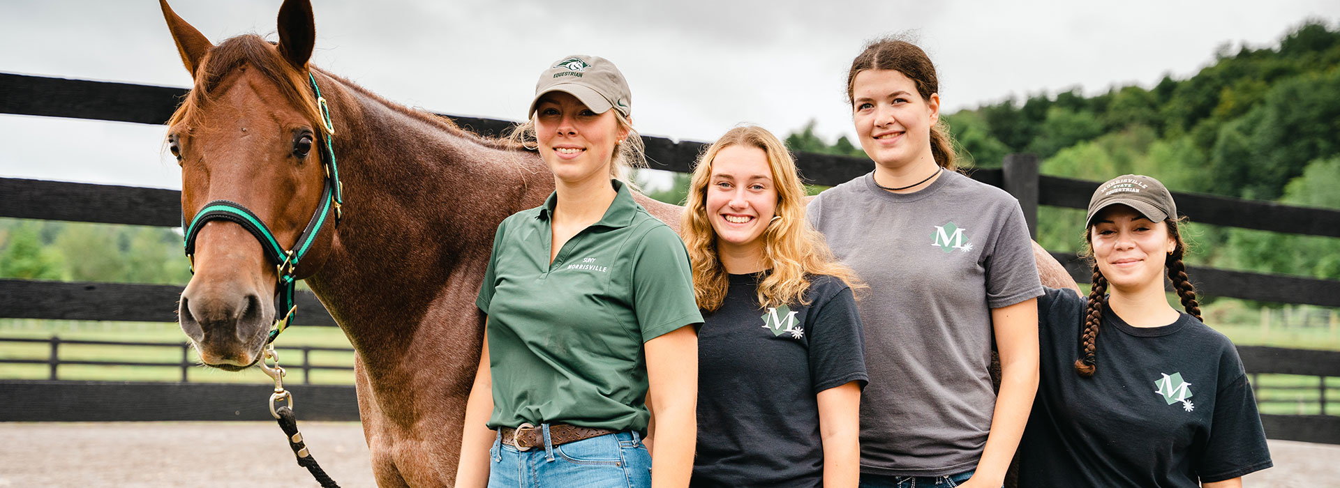 Posing with Finn are, from left, equine students Mak Park,Victoria Eqstein, Carli Potter and Gianna Auriemma.