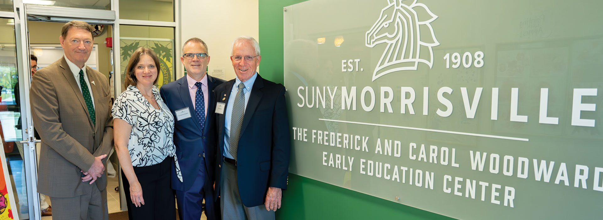 From left: SUNY Morrisville President David Rogers; Lisa Woodward; Scot Zaremba-Woodward; and former SUNY Morrisville President Frederick Woodward