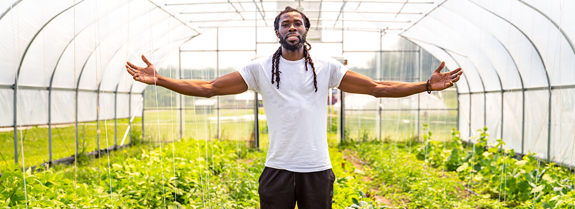 Tweh Johnson in the green house