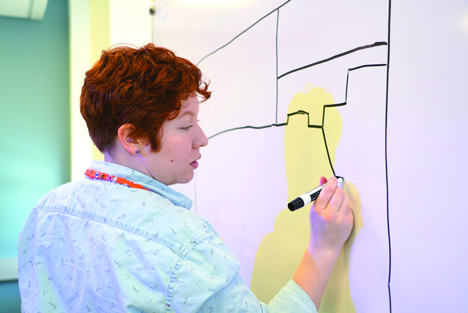 A participant in last year's Global Game Jam prepares a portion of her team's game.