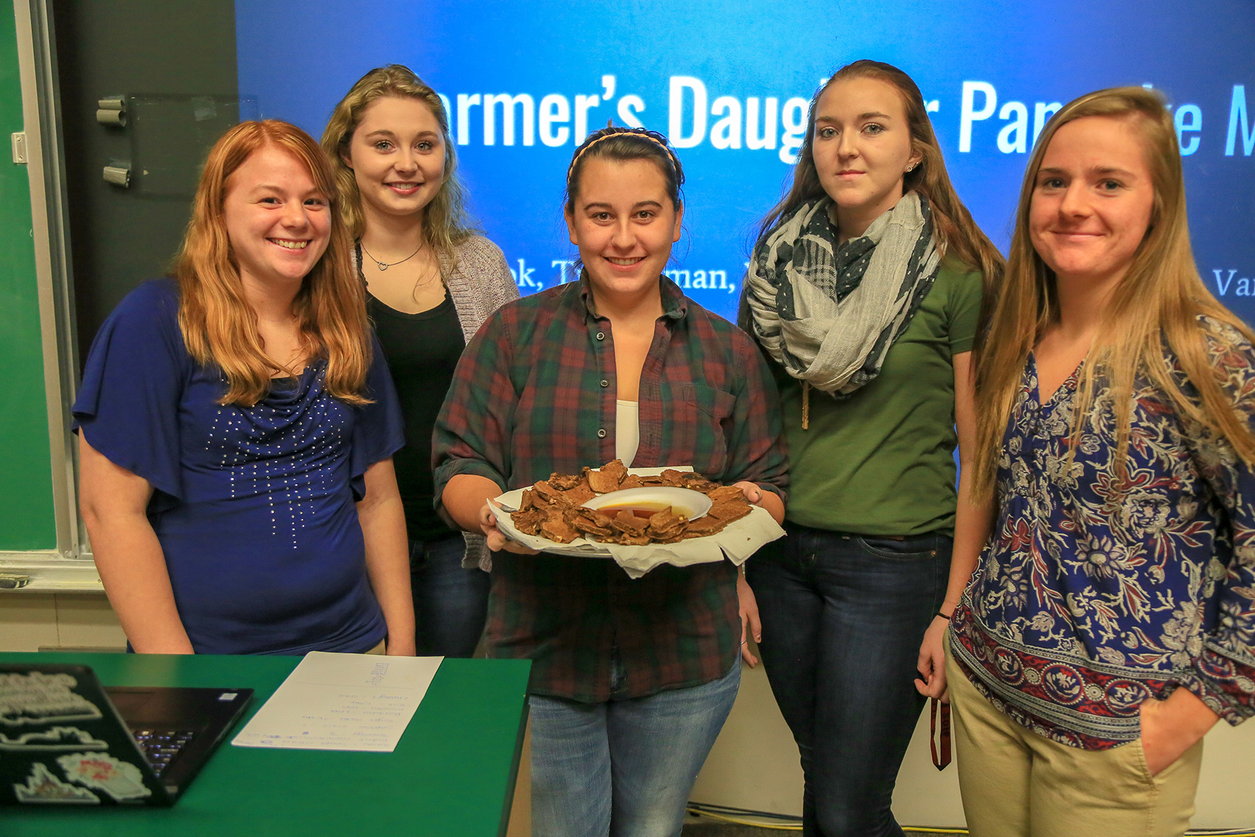 Agricultural business students present their product, The Farmer’s Daughter, a pancake mix. Pictured, from left: Vicki Grey, of Cattaraugus; Libby Snyder, of Scottsville, Leah Vancour, of Vernon, Connecticut; Ty Rodman, of Van Etten; and Grace Book, of Bliss.