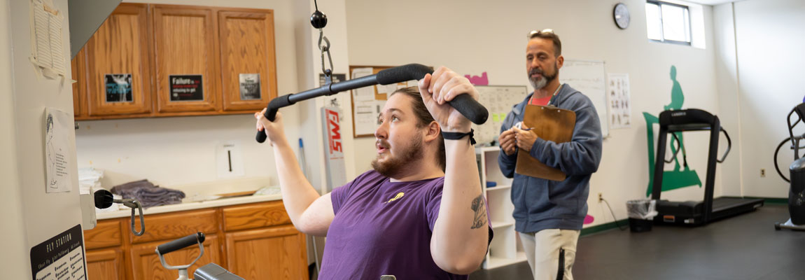 Exercising under supervision in the Wellness Center