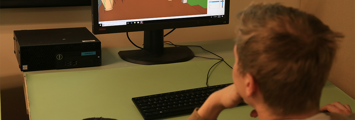 Student designing something on a computer