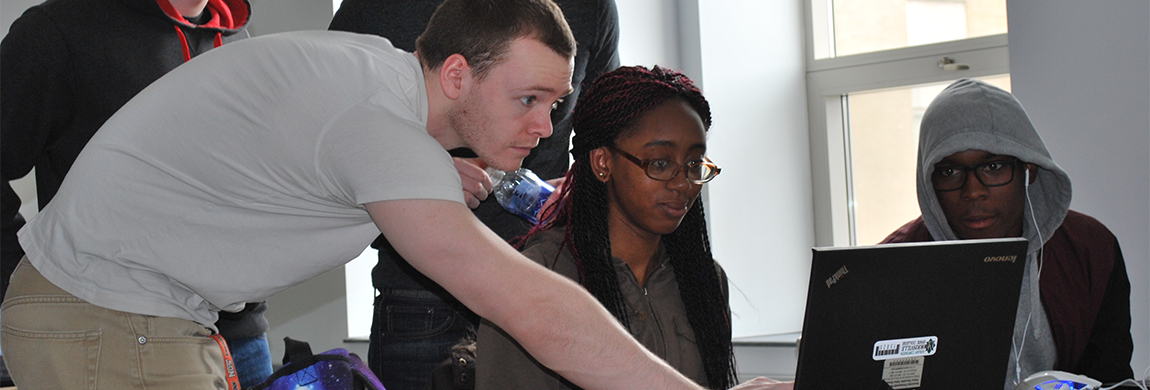 Student troubleshooting a computer system