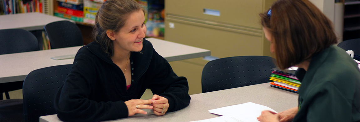 Student helping someone