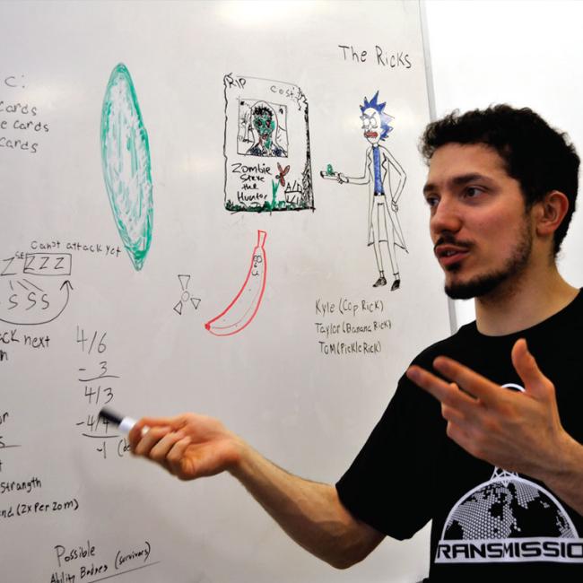 Taylor McDowell works on developing a game in 48 hours during a past Global Game Jam™ , the world’s largest game creation event.