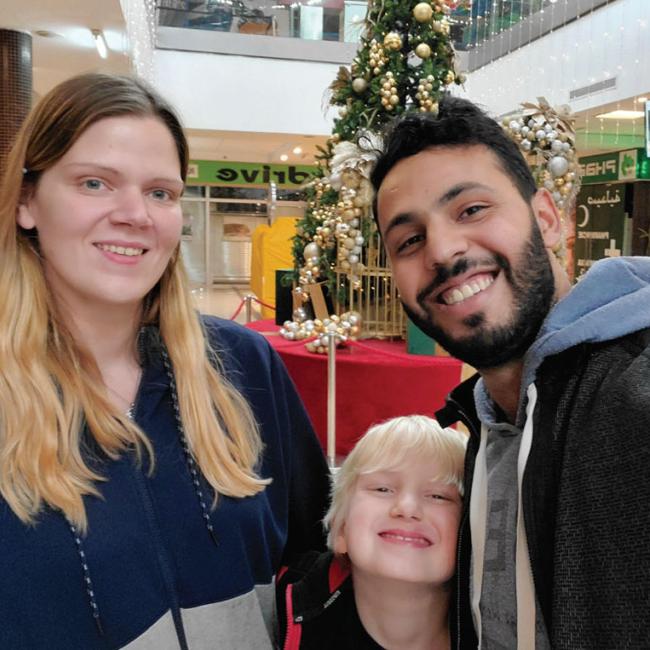 Posing from left: Jessica Miller, her son Owen, and Mouaad Essaadi.