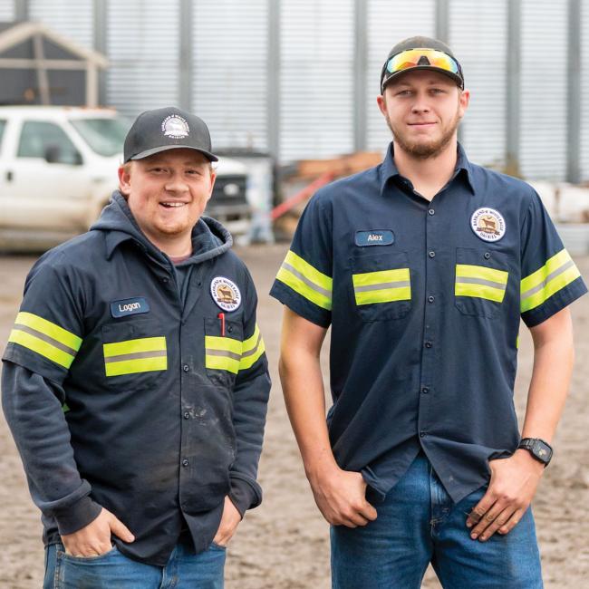 From left: Logan Martin '15 and Alex Evans '20 at Barbland Farms