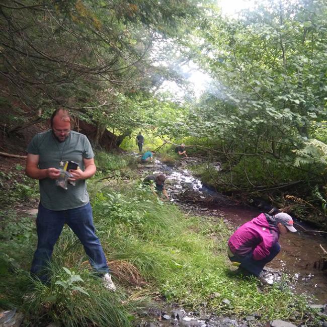 Norwich students search for species of salamander and toad at Owens West Wildlife Management Area during a “live-learning” Herpetology class.