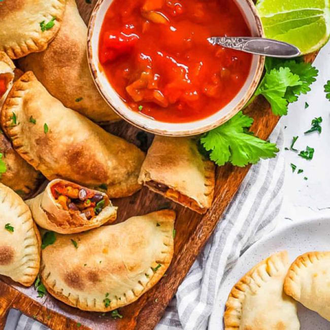 Empanadas with salsa and cilantro
