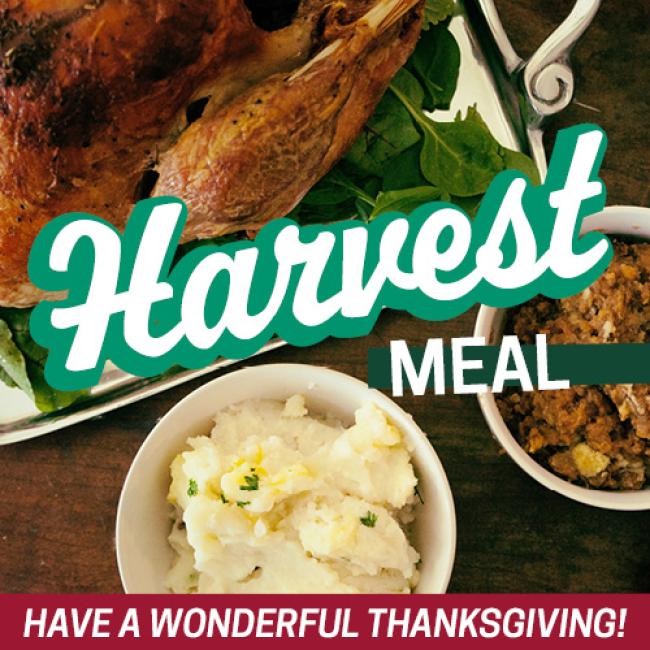 Harvest Meal text over cooked turkey and bowls of mashed potatoes and stuffing.