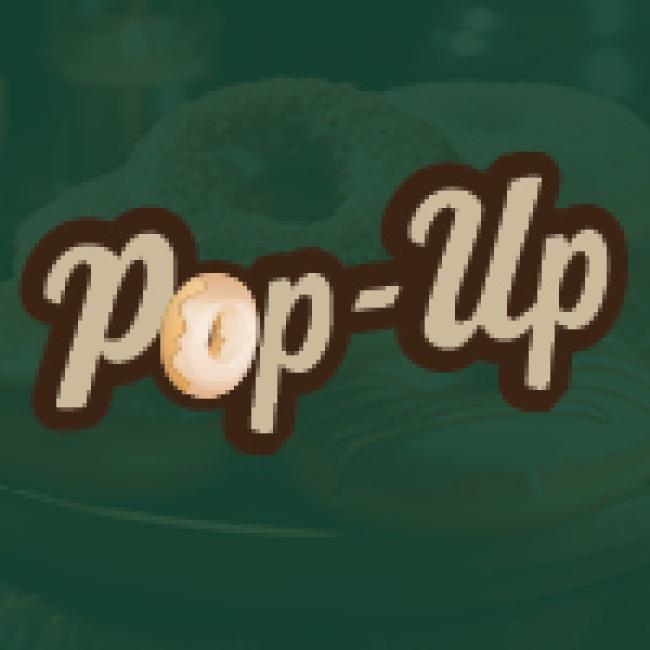Green Background with the text "Pop-Up", the "o" in "Pop" is an illustrated donut.
