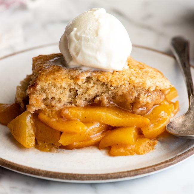 Peach cobbler with vanilla ice cream