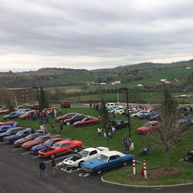 Classic and modern cars lined up to show; Photo credit: Impavidus Studios Photography