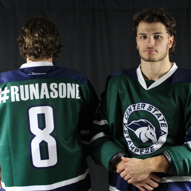 The front and back of the support the Center State Youth Hockey Association jerseys the men's ice hockey team will auction off to benefit CSYHA.