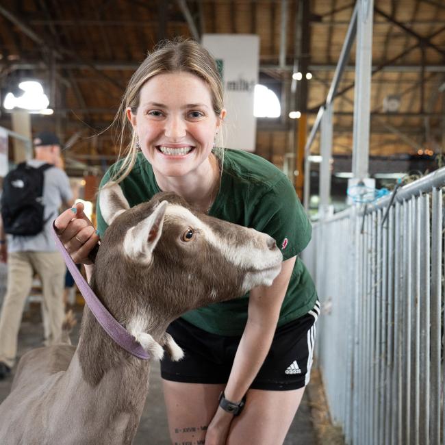 Rosie Hines with her goats at the State Fair
