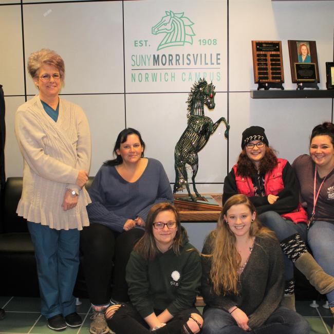 Assistant Professor Julanne Burton with students from her Human Services class.