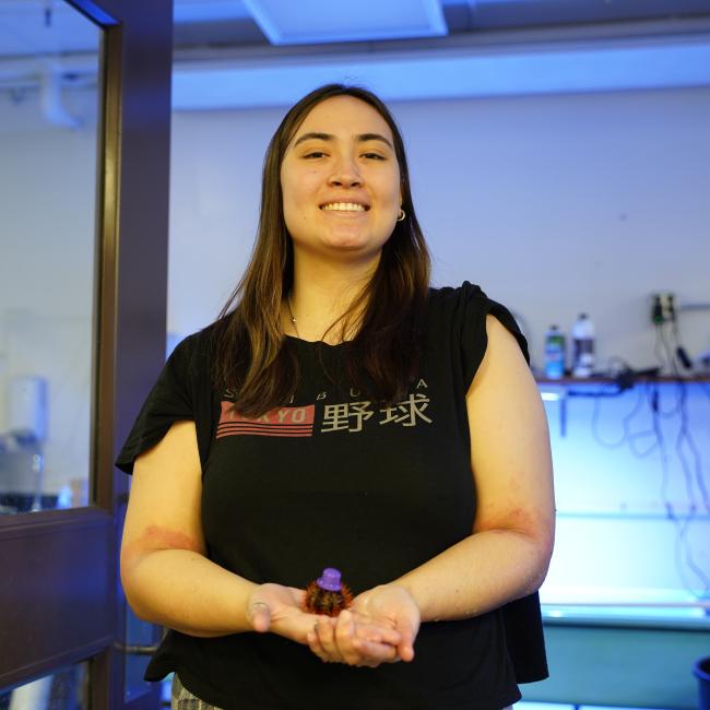 Rachel Soong holds a sea urchin