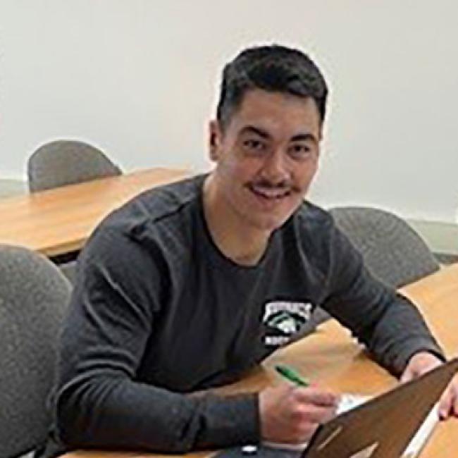 Business Administration students work in a classroom