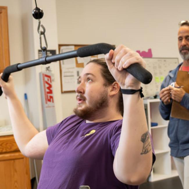 Exercising under supervision in the Wellness Center