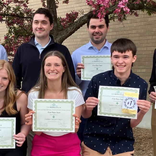 Agricultural Business Development students showing off their certificates