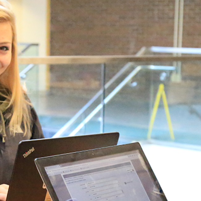 Students work on laptops