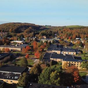 Academic quad from above. Many buildings and trees.