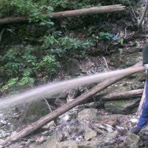 Flushing the penstock on a local micro hydro system