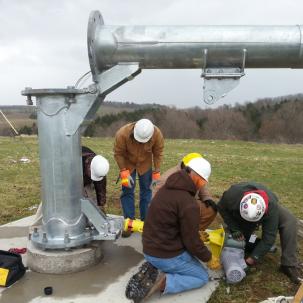 Preparing to raise the campus tilt-up wind turbine tower