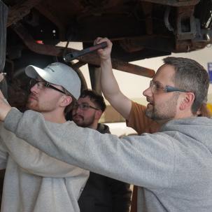 Morrisville Alum Matt Polak instructs a MOPAR student.