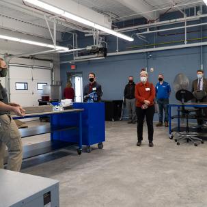 Visitors receive a tour of the Thermal/Combustion Lab.