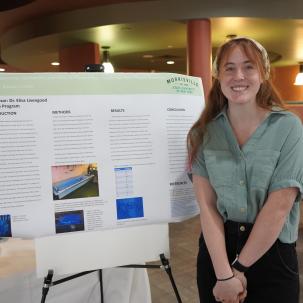 Student with poster