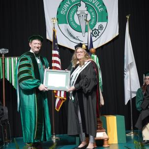 Sheila Marshman receives her award