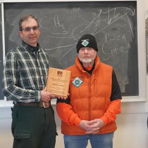 Brendan Kelly with his award