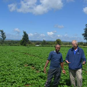 Christopher Scalzo, associate professor of business and entrepreneurship at SUNY Morrisville, gathers information from a farmer during his trip to Kenya, East Africa.  