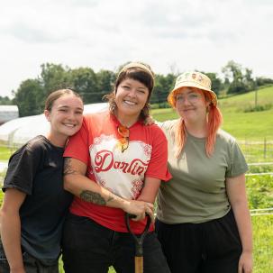 Ella Williams, Kate Bolen and Lucy Dixon at the organic farm 