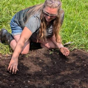 Professor Jennifer Gilbert Jenkins plants seeds 