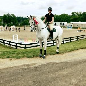 Student riding a hunt seat horse